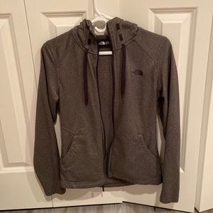North Face grey zip up jacket with hood and pockets